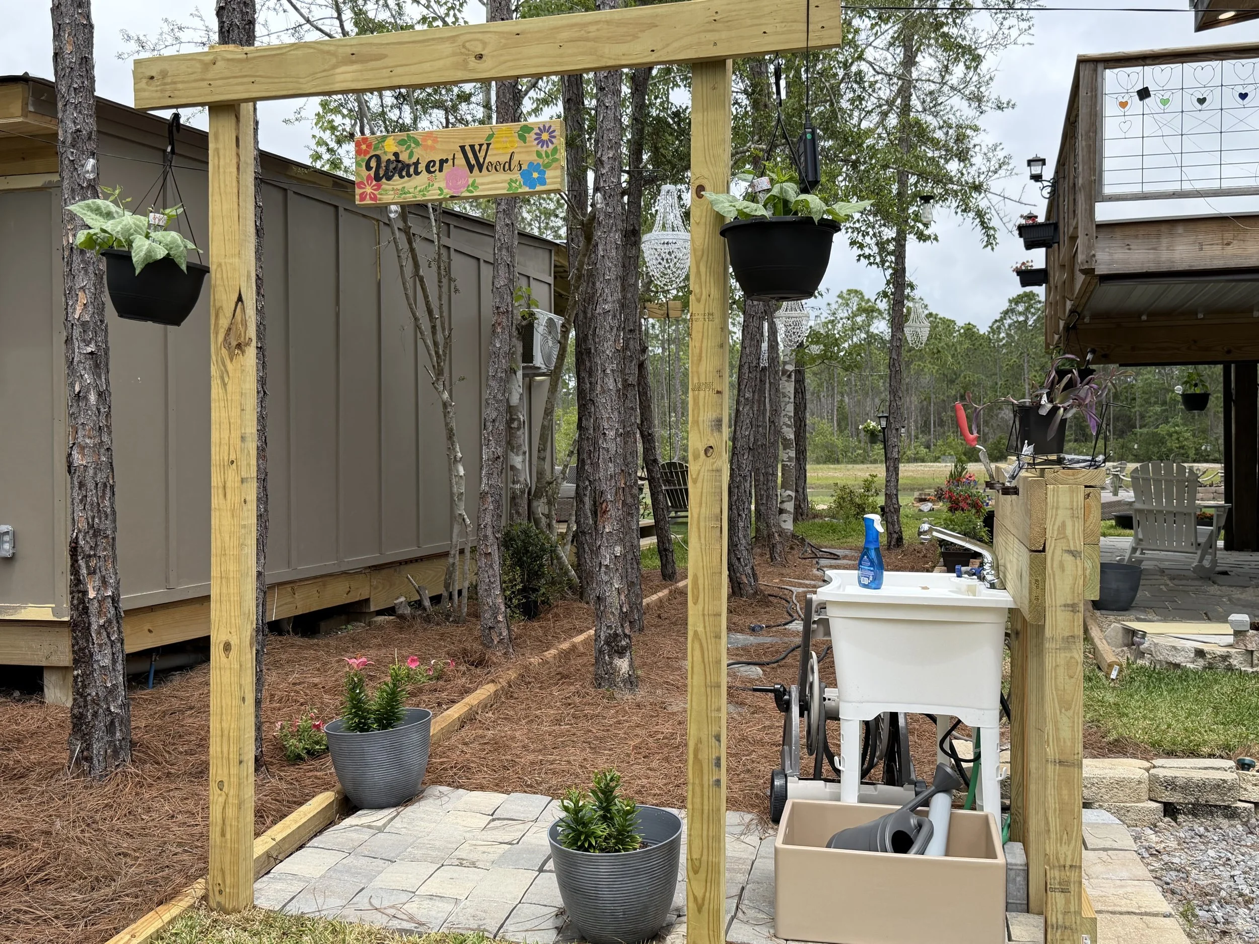 Water + Woods is an outdoor wedding and event venue in Gulf Shores, Alabama near Orange Beach and The Wharf.