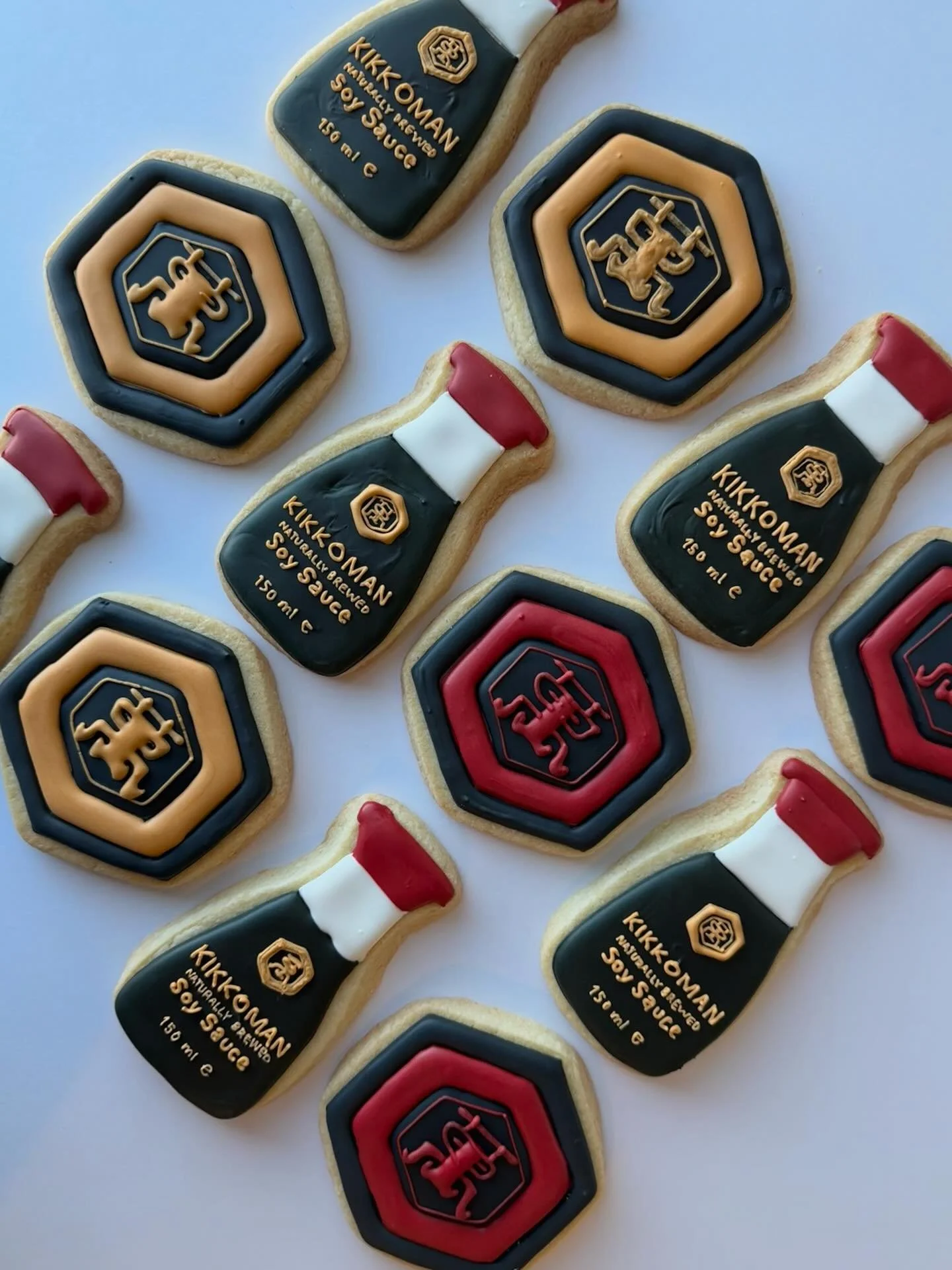 Soy excited to share these! 🍪 
Kikkoman never looked or tasted so sweet 🖤❤️ 

#kikkoman #cookieart #royalicing #decoratedcookies #cookiesofinstagram 
@kikkomanusa