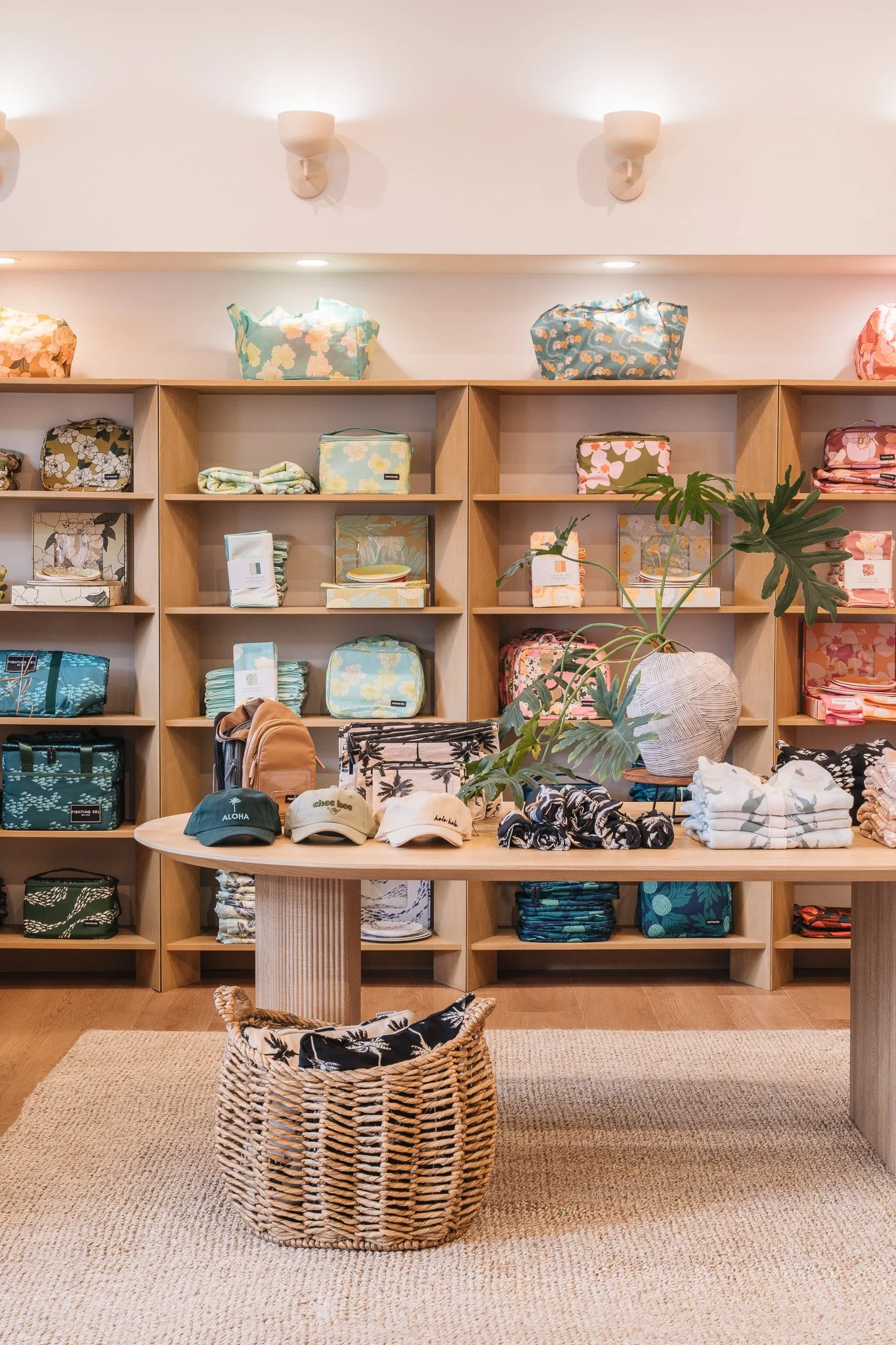 This little corner of the Manoa store shows what good furnishing can accomplish. The corresponding furniture pieces tie together the space creating a built-in looks on a budget.