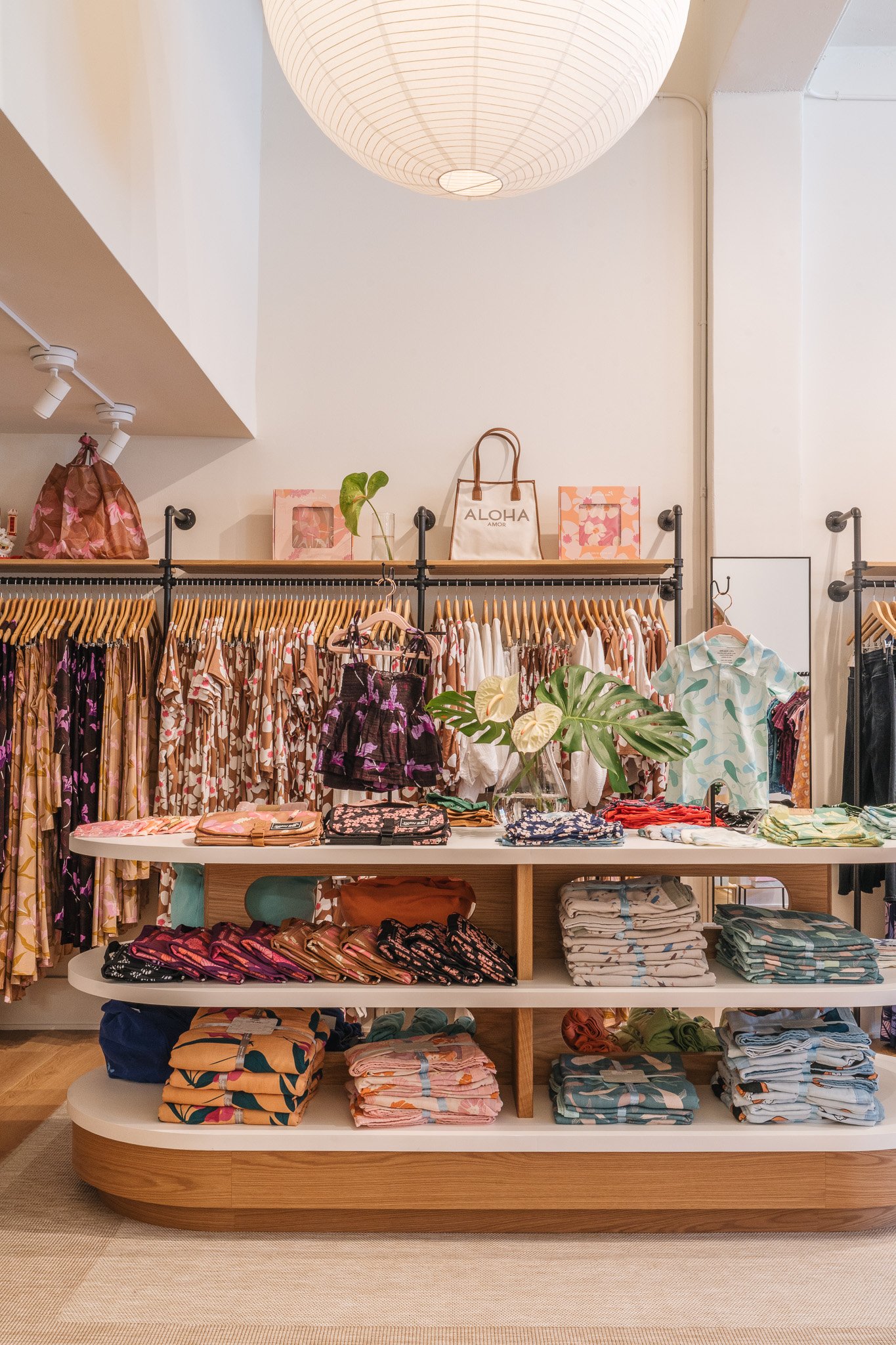 This retail space has designated hanging space as well as areas for folded product and accessories.