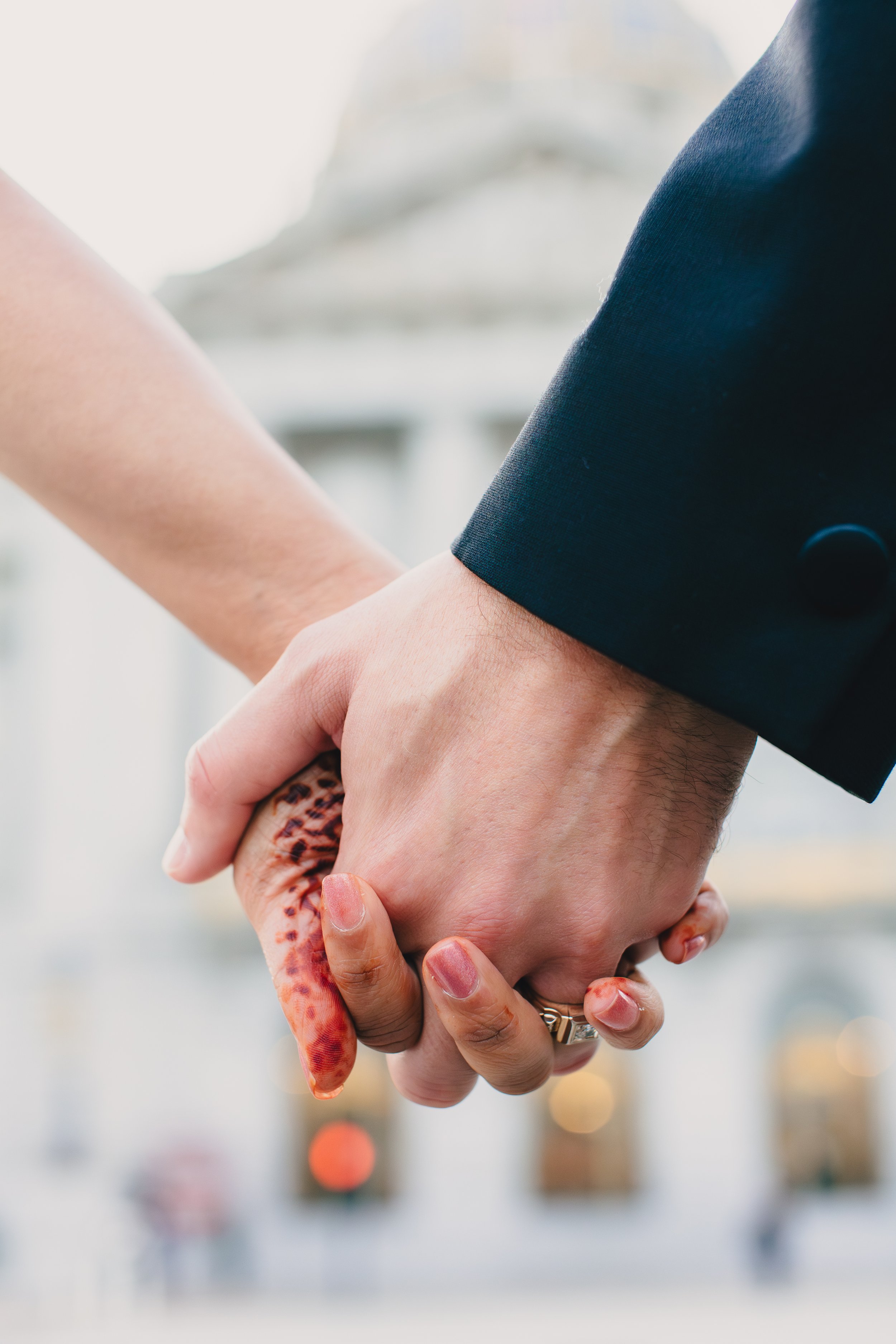 Holding hands in front of San Francisco City Hall