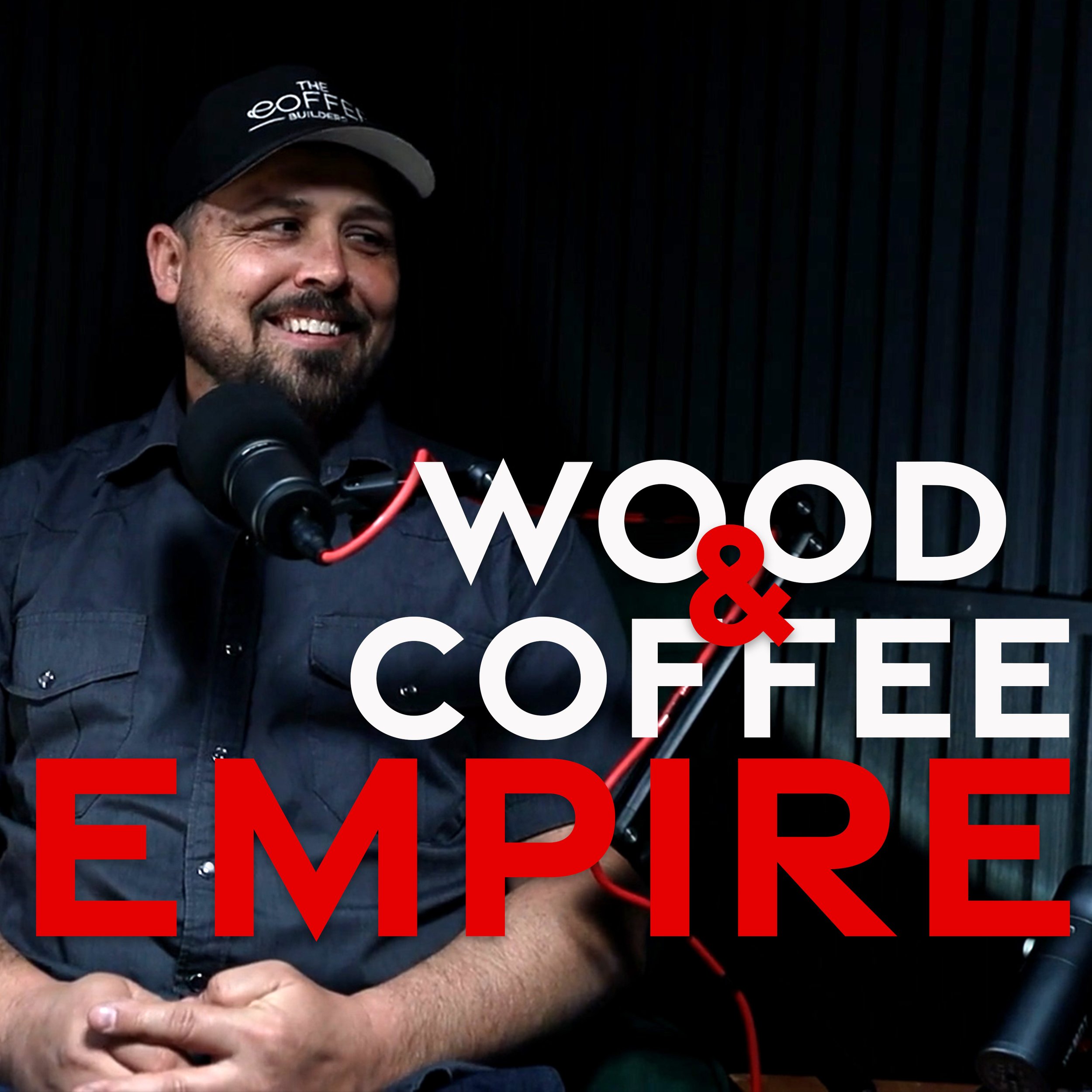 Thomas Porter smiling, sitting in front of a microphone inside of the Mobile Podcast Trailer, wearing a "The Coffee Builders" hat and dark shirt, with the words 'Wood & Coffee Empire' overlayed on the image.
