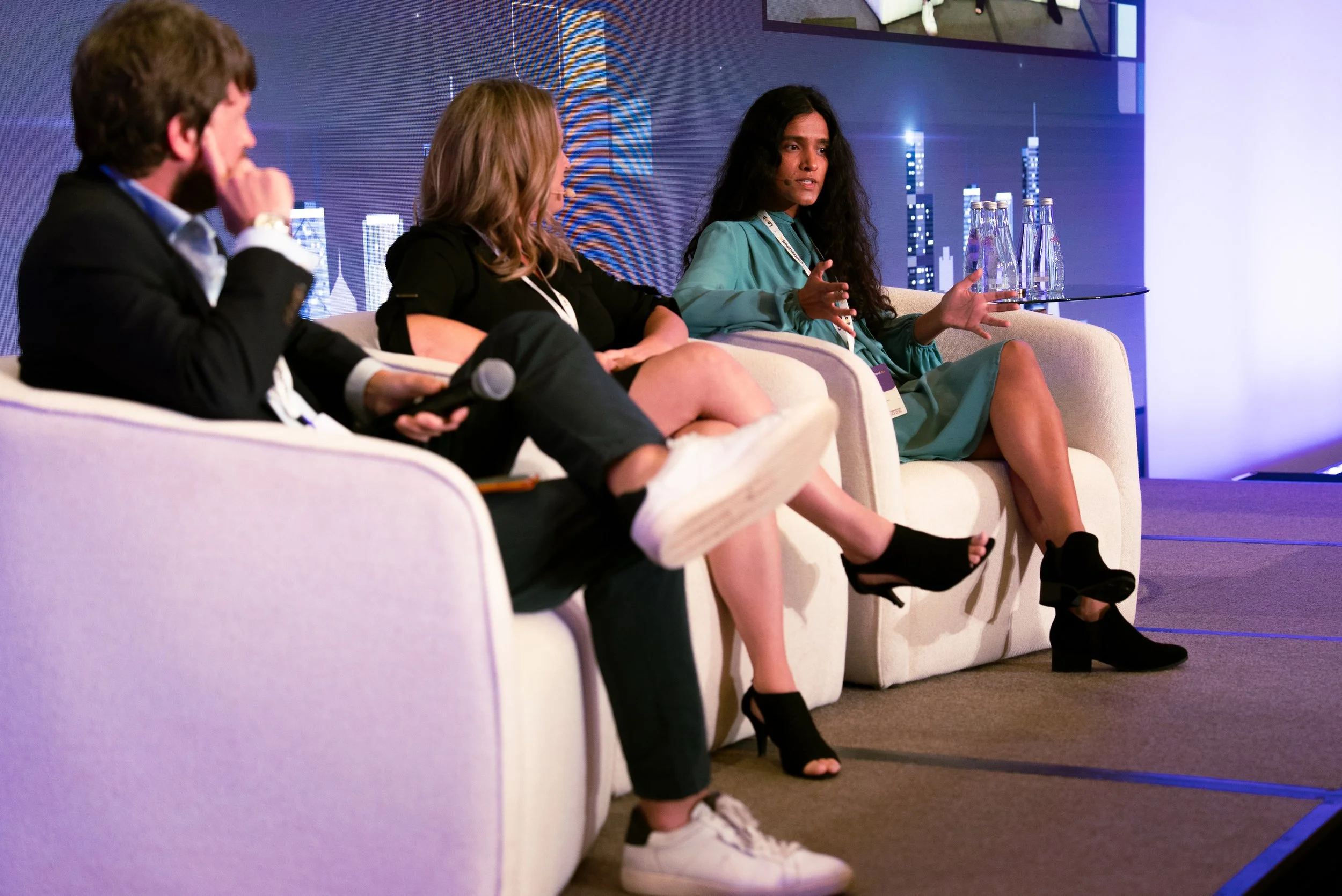 Woman Speaking to Two People.jpg