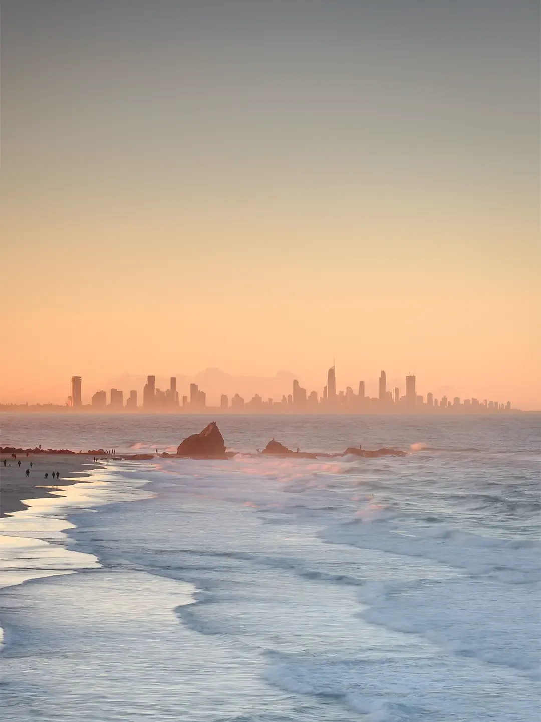 Image shows the Gold Coast skyline at dusk.
