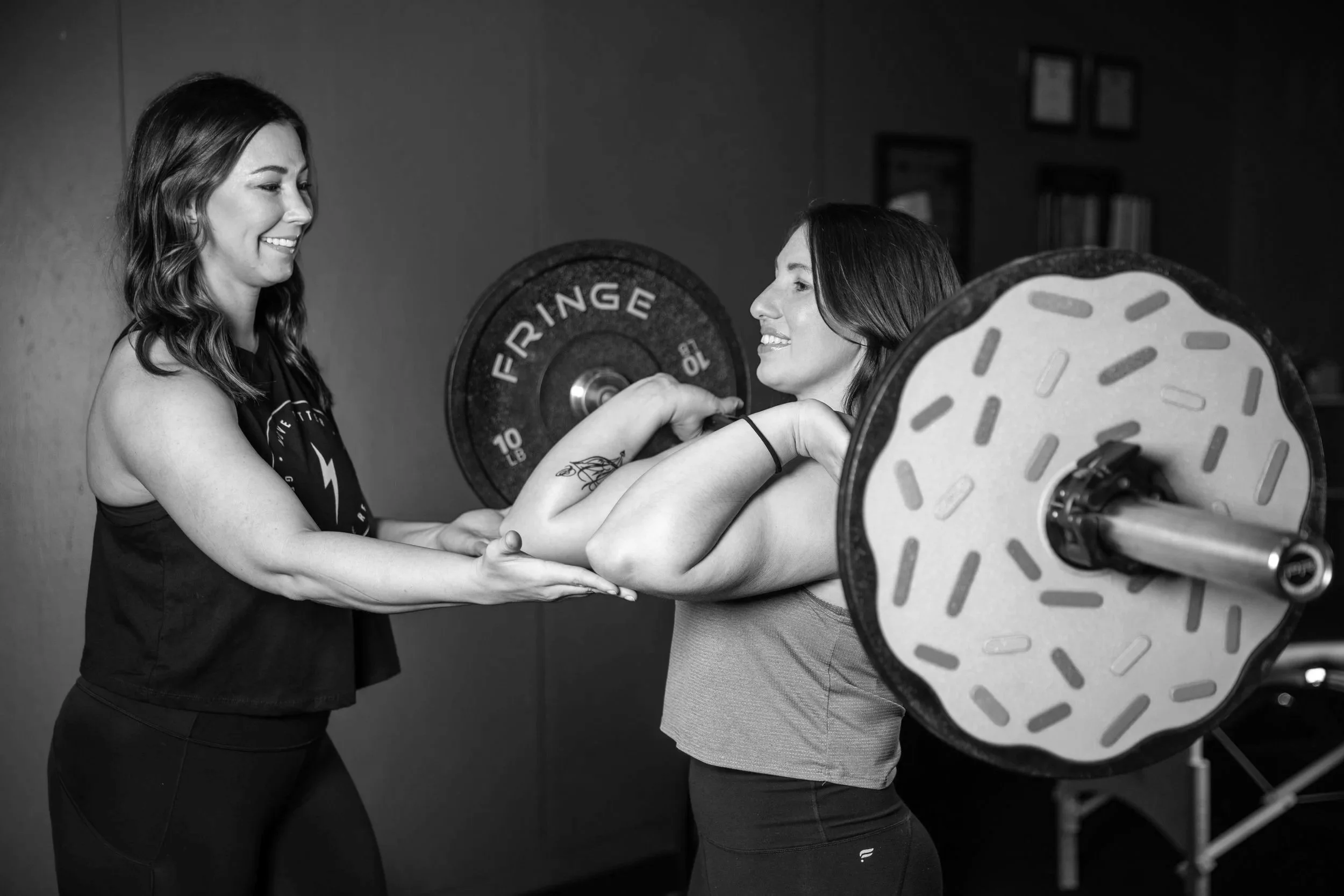 Improving front rack position during a barbell front squat to decrease wrist and shoulder pain.