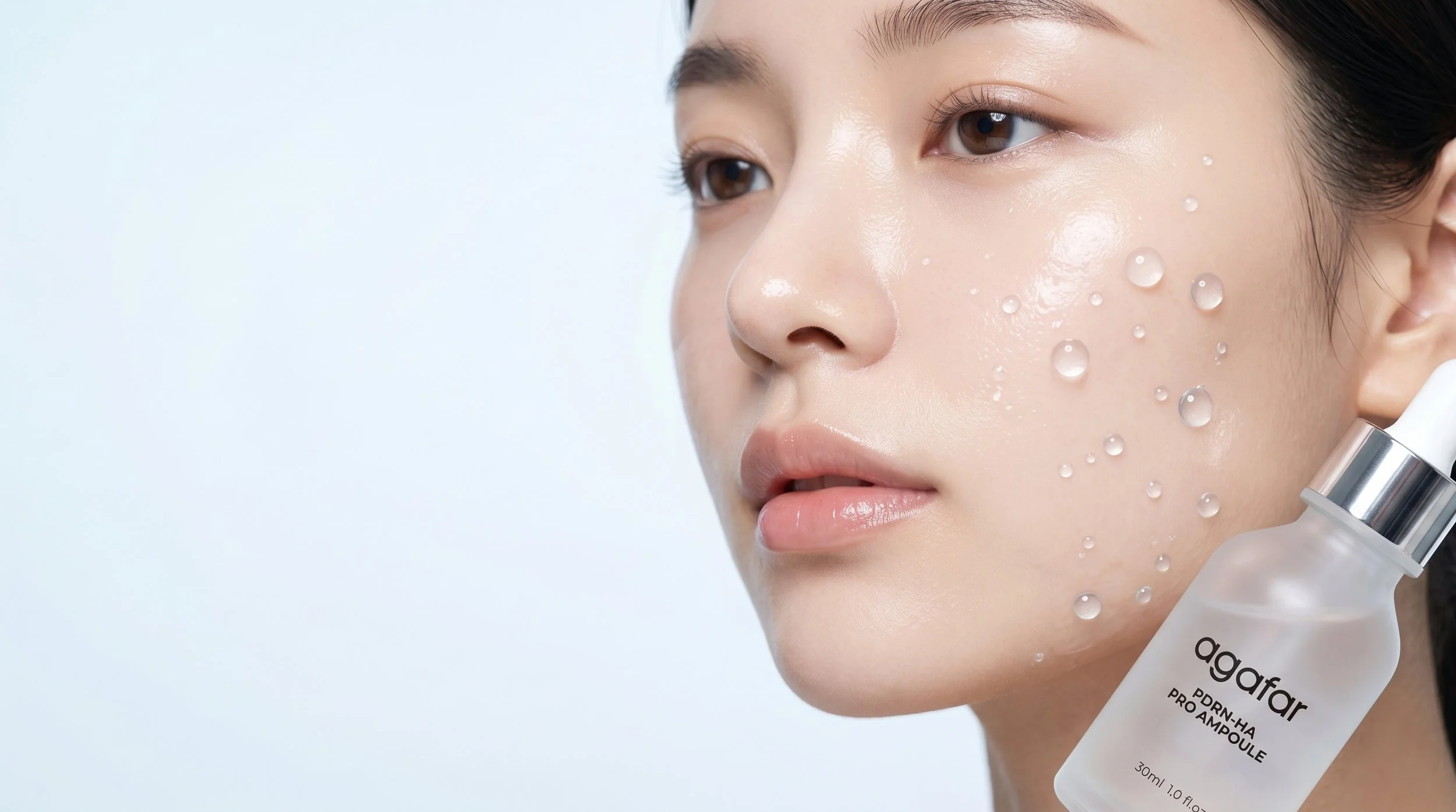 Woman's_cheek_with_water_spheres_2K_20260914150749.jpeg