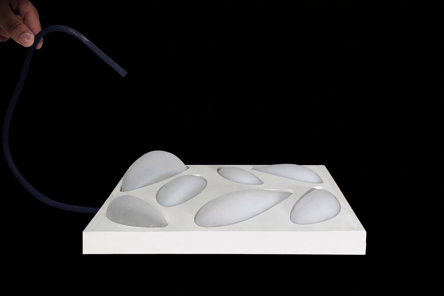 The building's design incorporates inflatables that adjust in size based on specific needs, reflecting a commitment to resource-efficient and responsive architecture