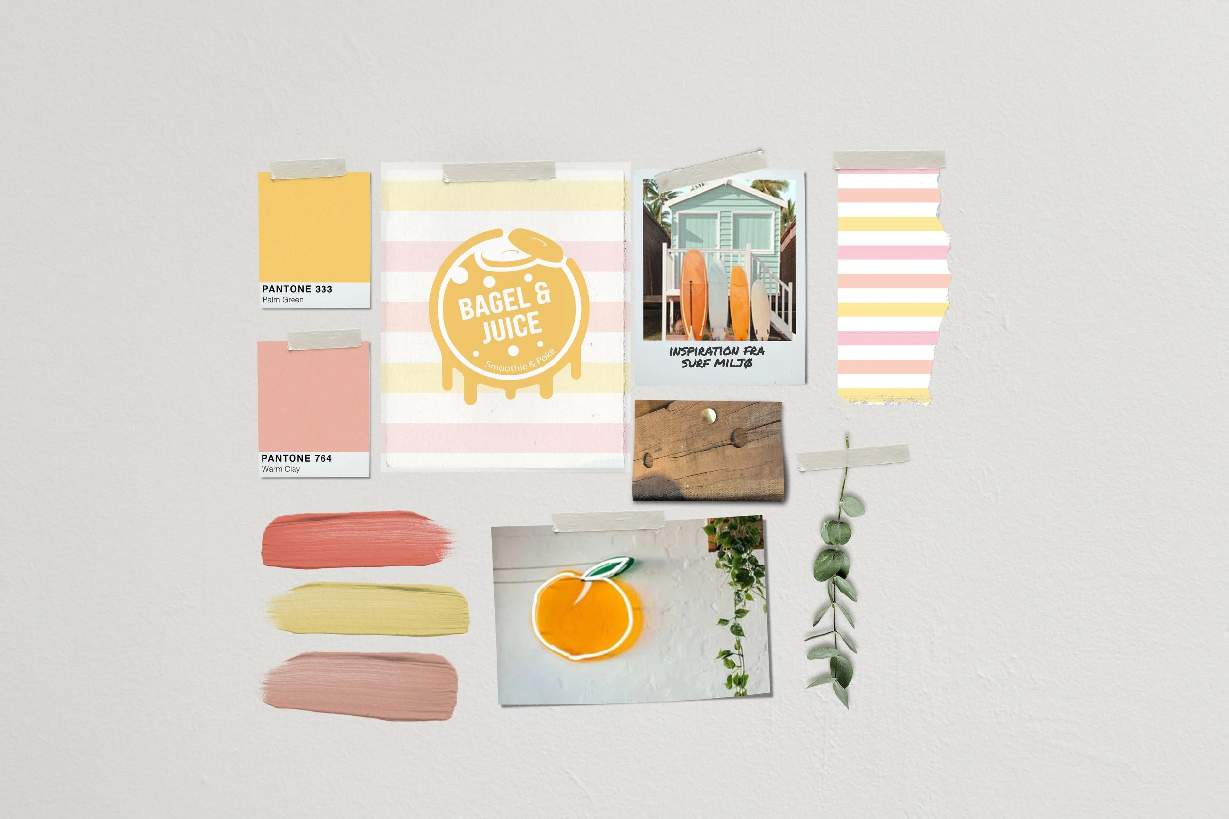 Billedevæg med farver og dekorationer, herunder fyrfadslys, fotos, farvetegninger, planter og notesbøger