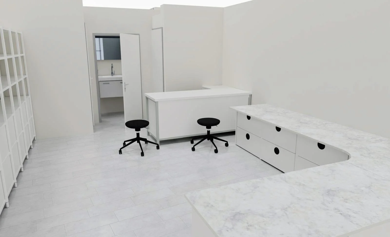 A minimalist, all-white room with marble countertops, black rolling stools, a white cabinet with black circular accents, a small half-wall, and an open door leading to a bathroom with a sink and mirror.