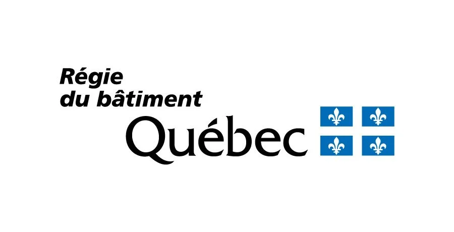 Logo of the Quebec Building Authority, featuring the text 'Régie du bâtiment Québec' with four blue squares each containing a white fleur-de-lis symbol.