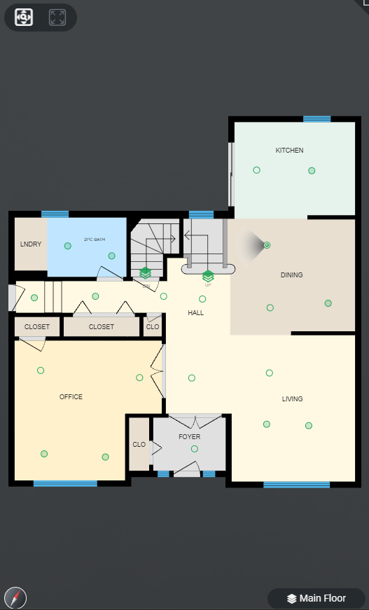 Floor plan of a house main floor showing rooms labeled as foyer, office, living, dining, kitchen, laundry, and a half bath, with a staircase in the center.