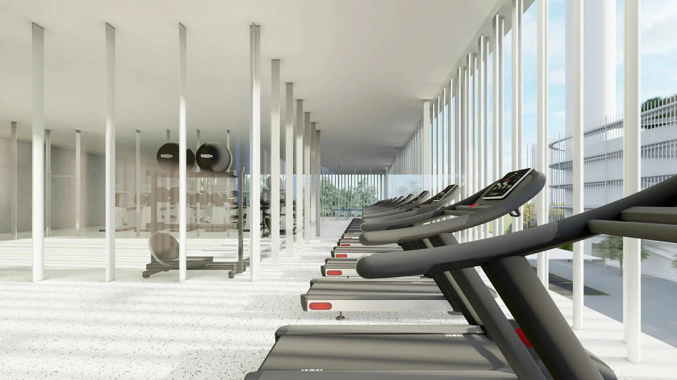 Modern gym with treadmills lined up by large windows, gym equipment mirrored on wall, and a white textured floor.