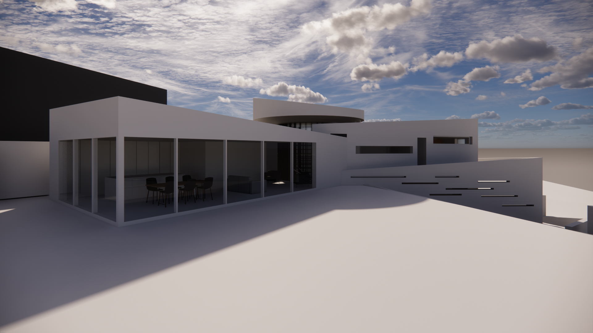 Modern, minimalist building with large glass windows, outdoor staircase, and unique architectural features under a partly cloudy sky.