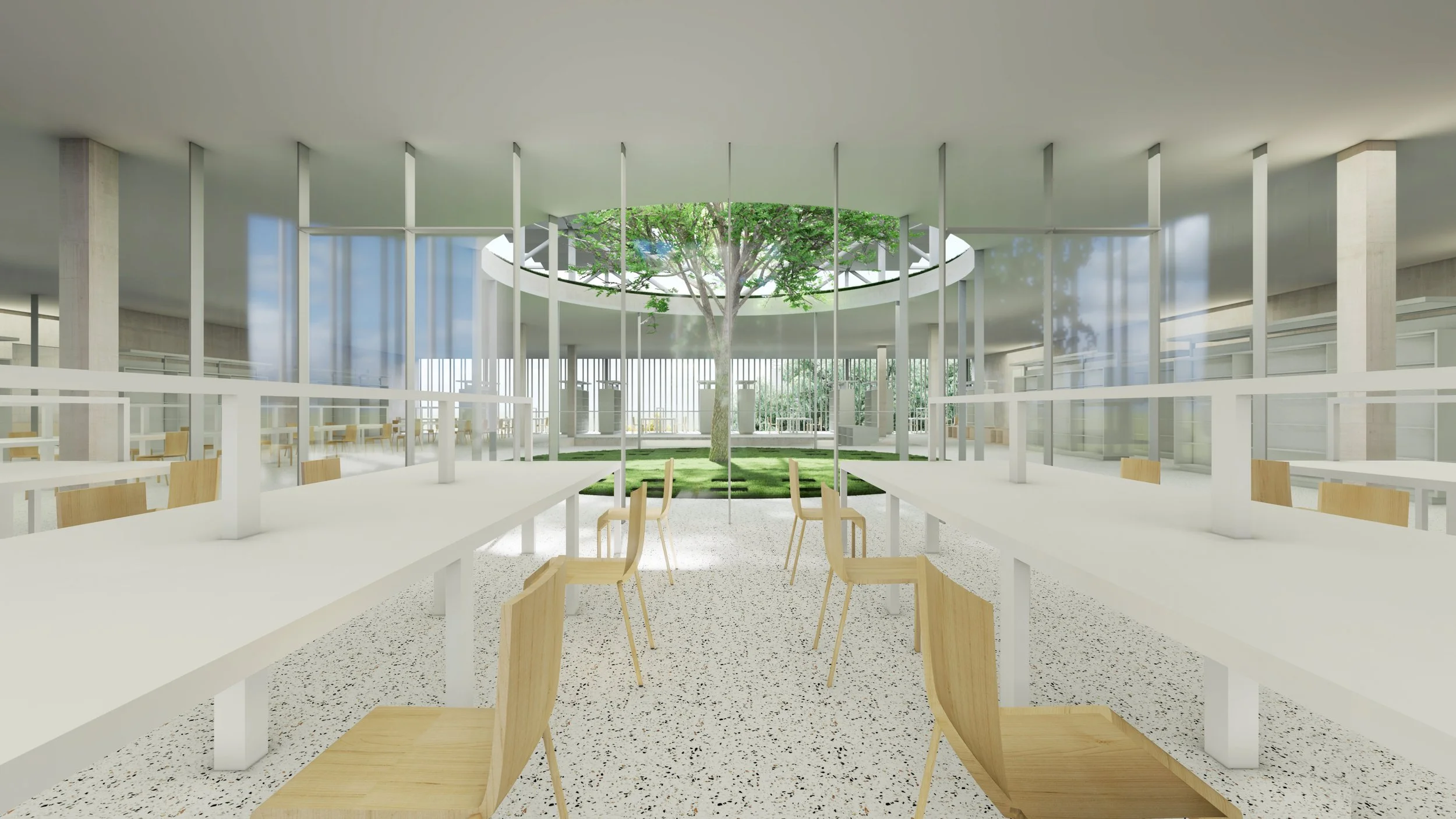Modern indoor space with white tables and light wooden chairs, featuring a central open courtyard with a tree and green grass, surrounded by floor-to-ceiling windows and vertical white structural elements.
