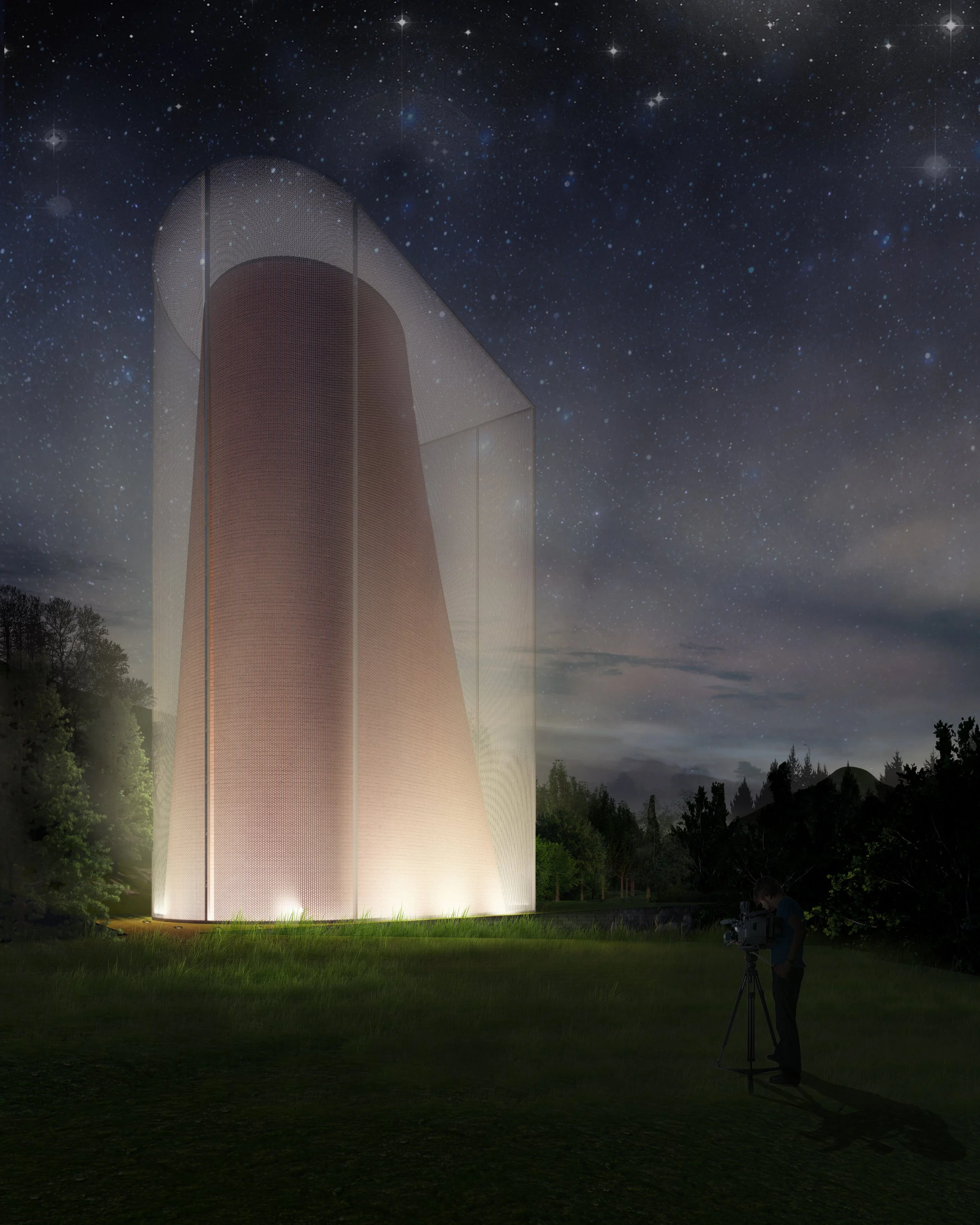 Night scene of a tall, cylindrical building illuminated from below, under a starry sky, with a person operating a camera on a tripod in the grassy foreground.