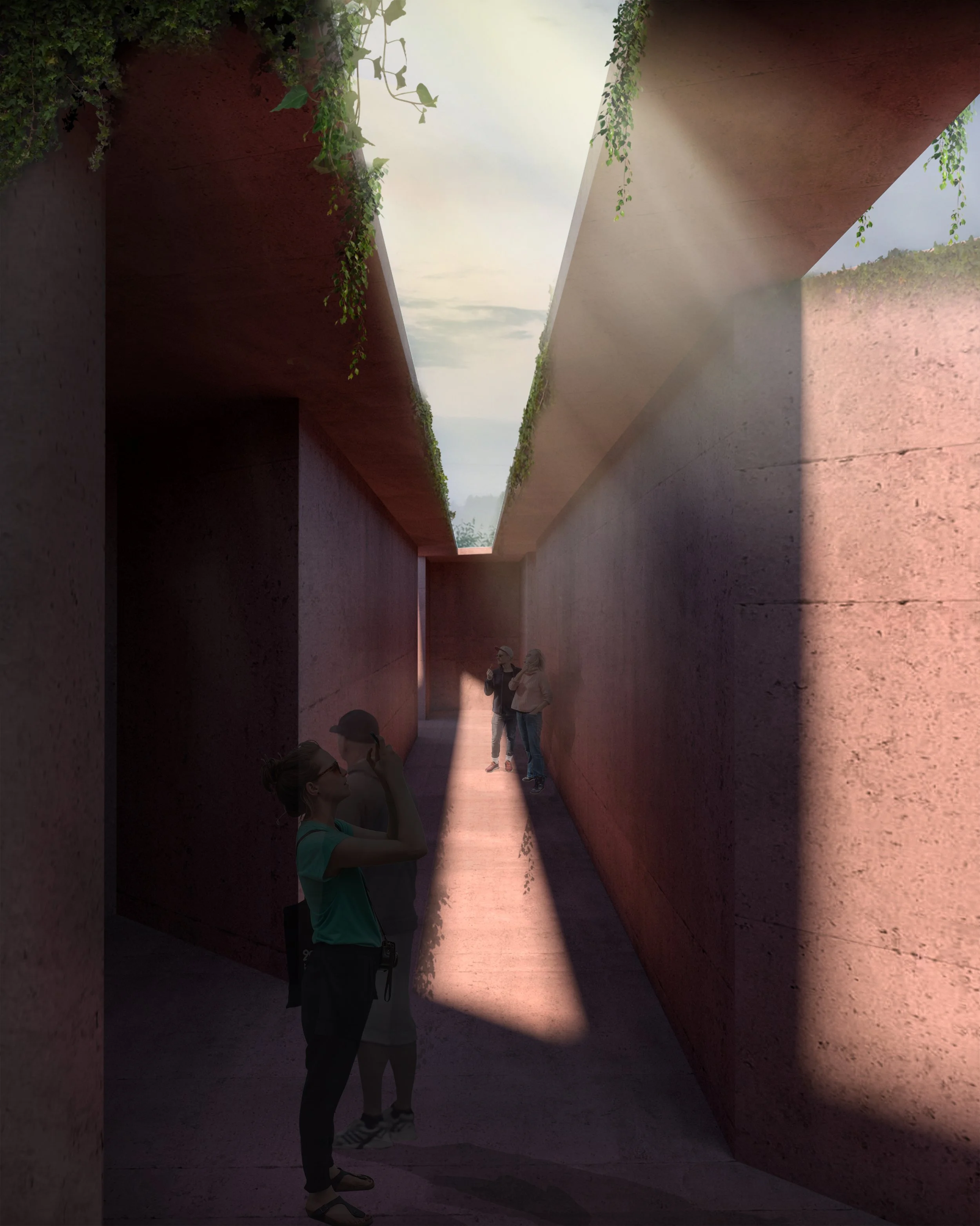 People walking through a narrow, open-air corridor with high walls and a view of the sky and greenery above.