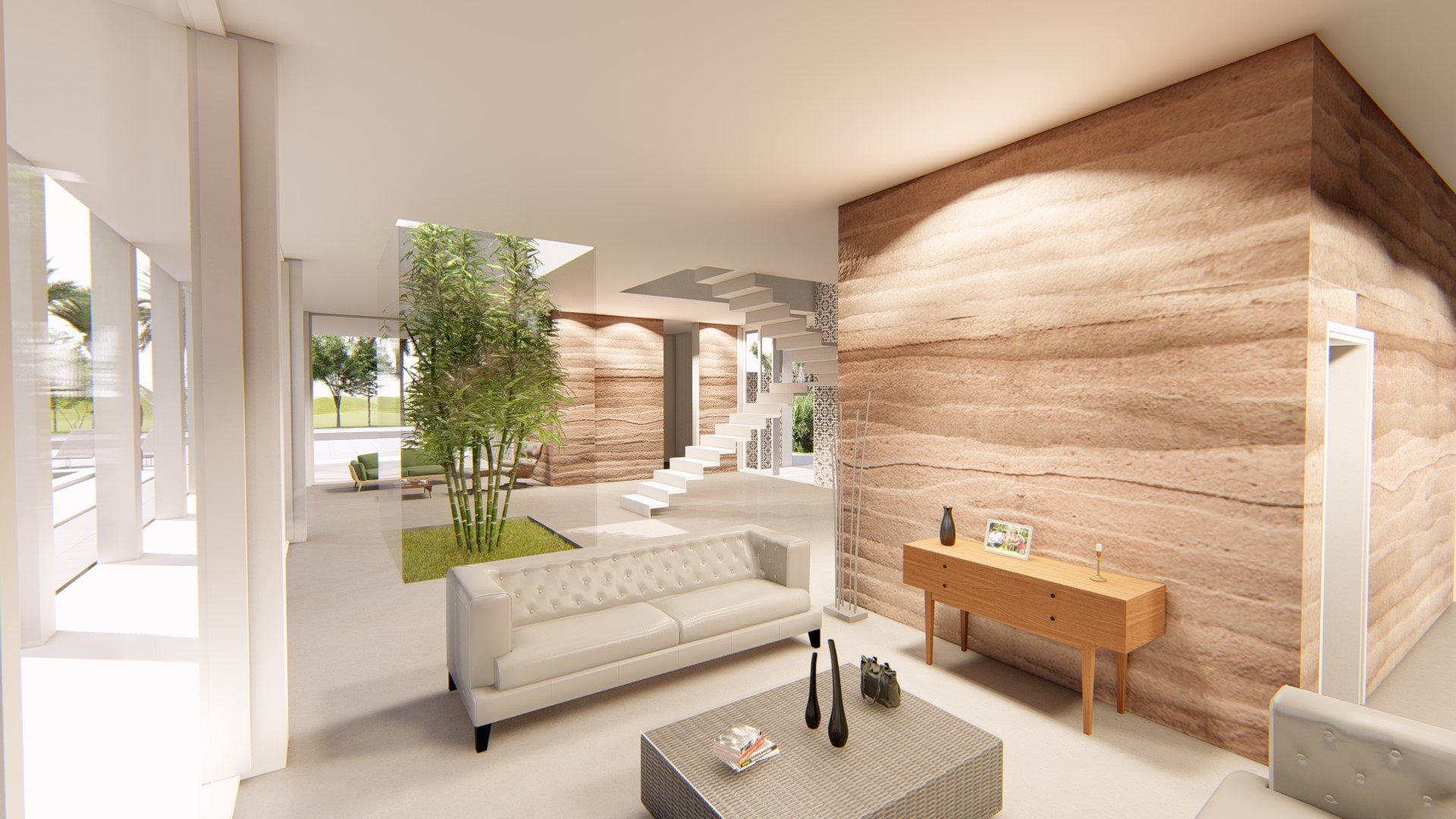 Modern living room with a white sofa, a wicker coffee table with books and vases, and a wooden sideboard with a picture frame and candle, featuring pinkish sandstone walls and white stairs leading up.