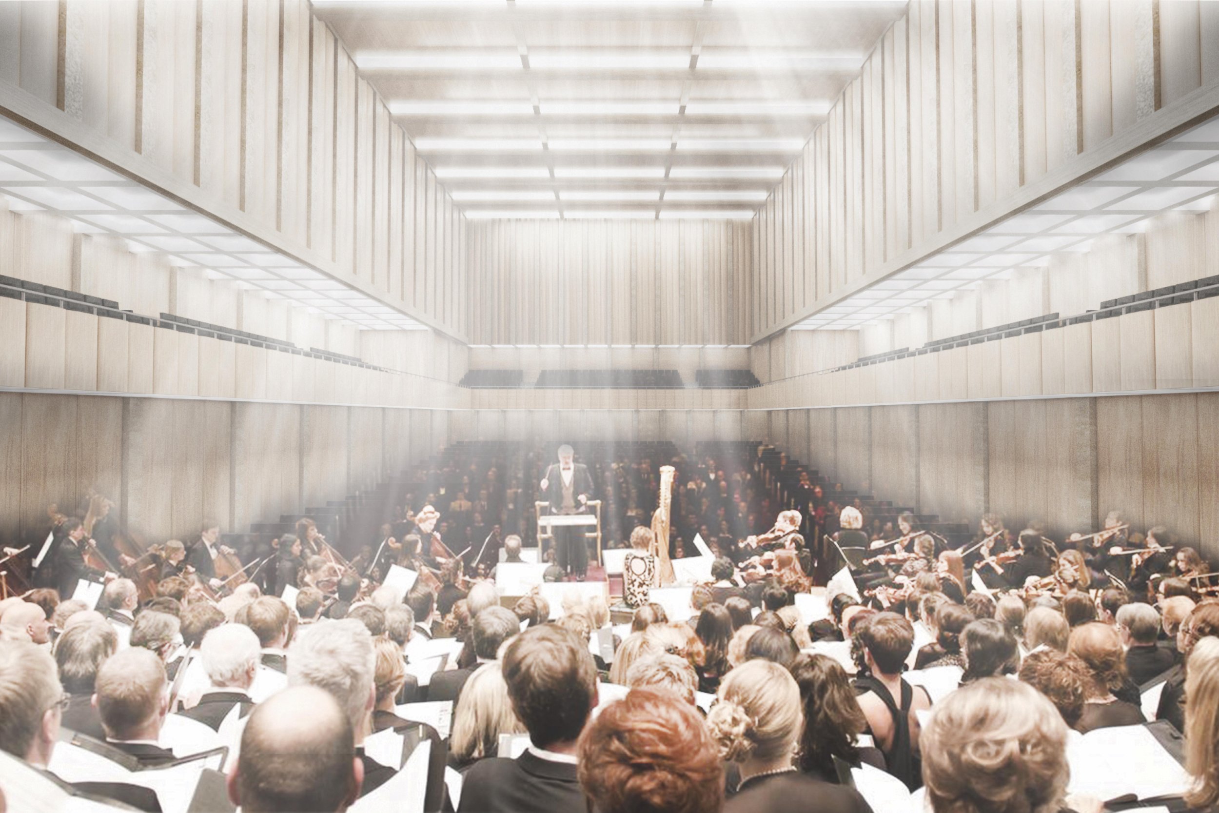 An orchestra performing in a concert hall filled with an audience.