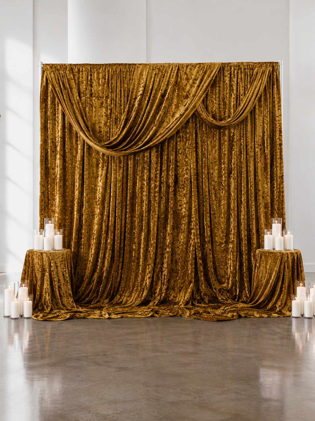 Gold  Drapery Backdrop 10ft by 10ft with 35 Sandwax candles and 4 Draped Pedestals- $400.00