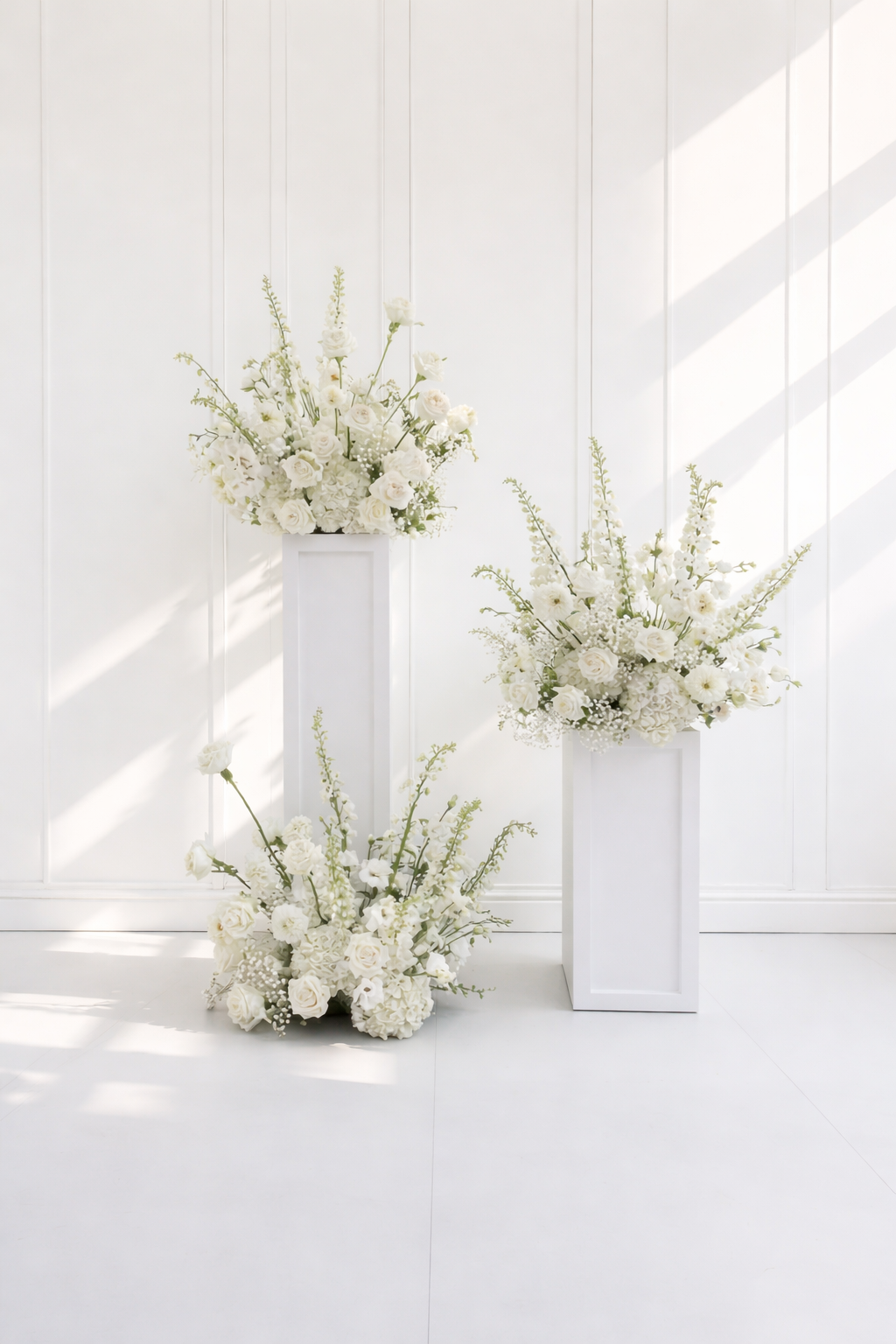 Etta Arch Scene (includes 4 pedestals and 6 florals) - $475.00