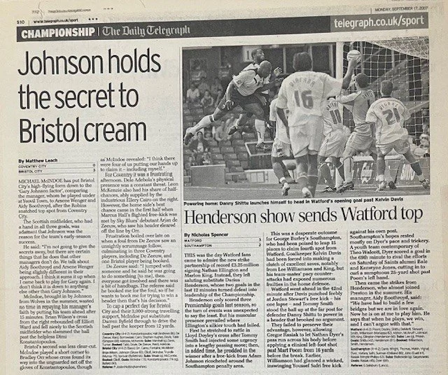 Newspaper page showing a soccer game with players jumping and the goalie diving to save a shot. The headline reads 'Henderson show sends Watford top'.