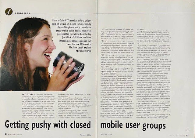 Open magazine pages featuring a woman smiling and holding a camera, with articles on mobile user groups and pushed updates.