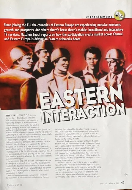 Magazine page with a red background featuring a vintage photo of six young adults wearing firefighter helmets. The heading reads 'EASTERN INTERACTION' in large white letters. The article discusses the Eastern Europe telemedia boom and includes references to the EU, Eastern Europe, and countries like Czech Republic, Slovakia, Poland, and Hungary. The date at the bottom is Autumn 2006.