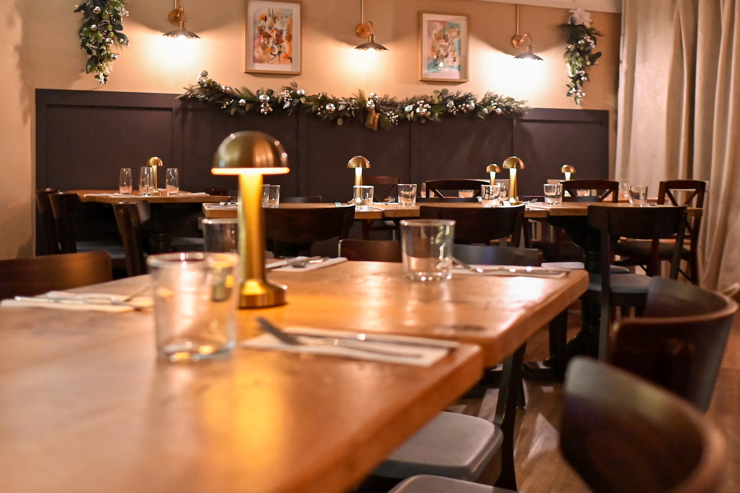 A cozy restaurant interior at Bolo & Brew café Wine Bar in Horsley, Surrey