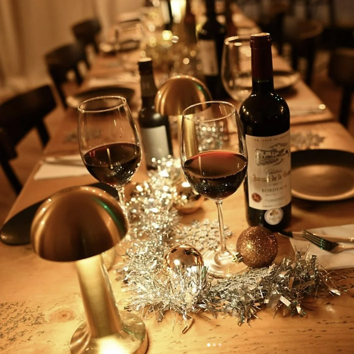 Wine glasses and bottle at Bolo & Brew wine bar in Horsley, Surrey