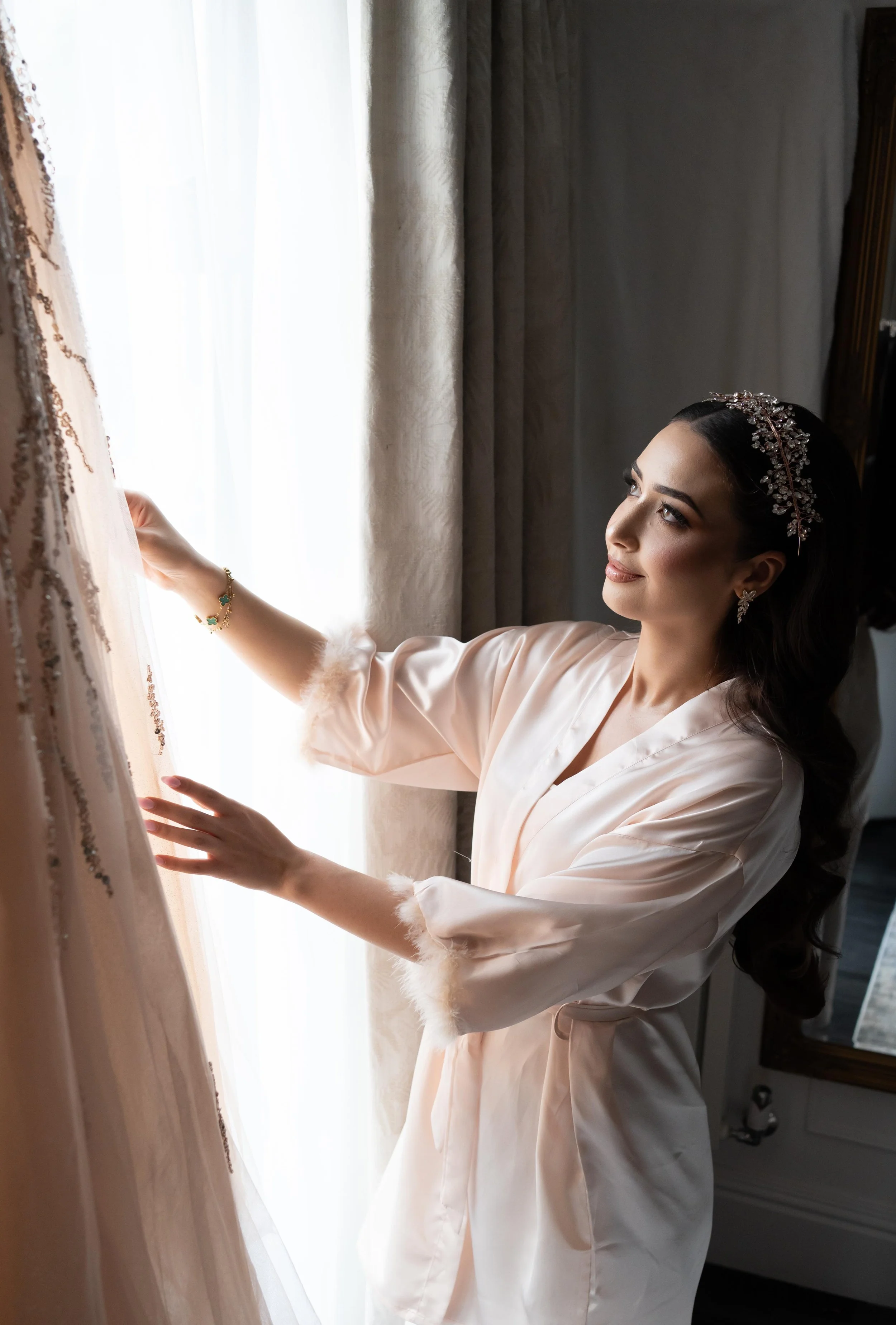 Wedding morning, bride ready in full hair nad makup glam
