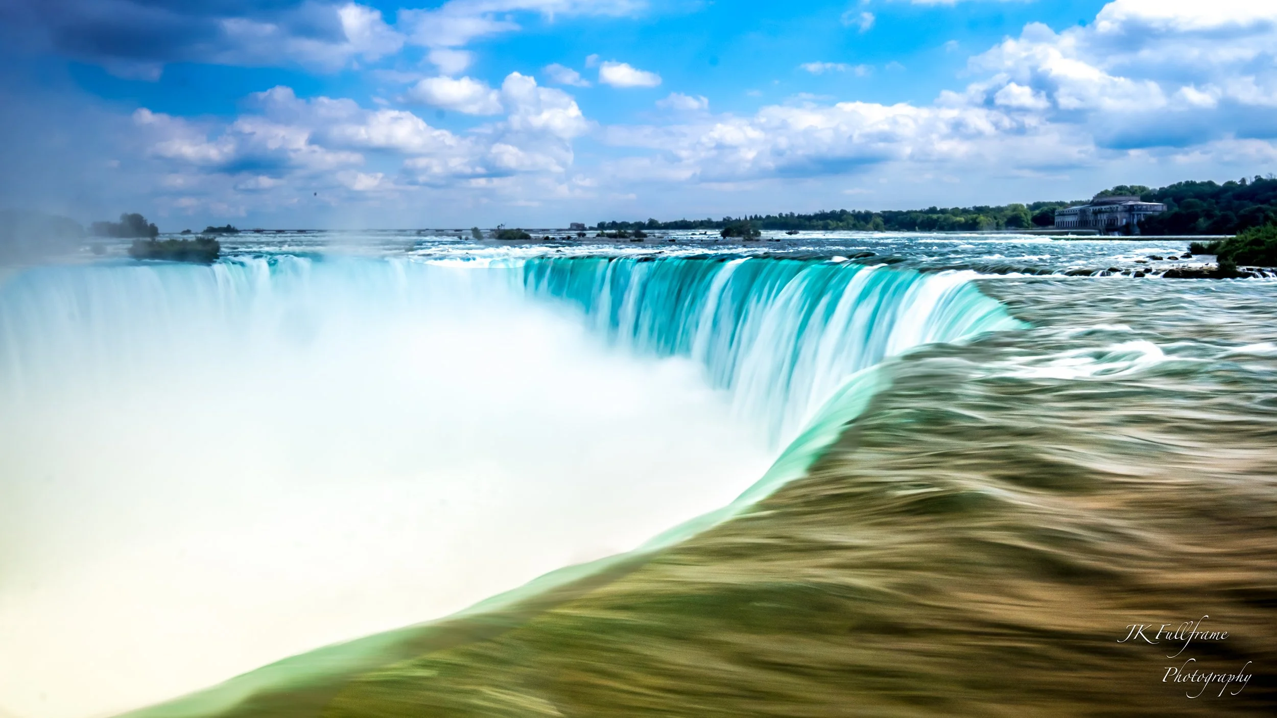 Niagara Falls, the collection of three large, powerful waterfalls on the border of the United States and Canada