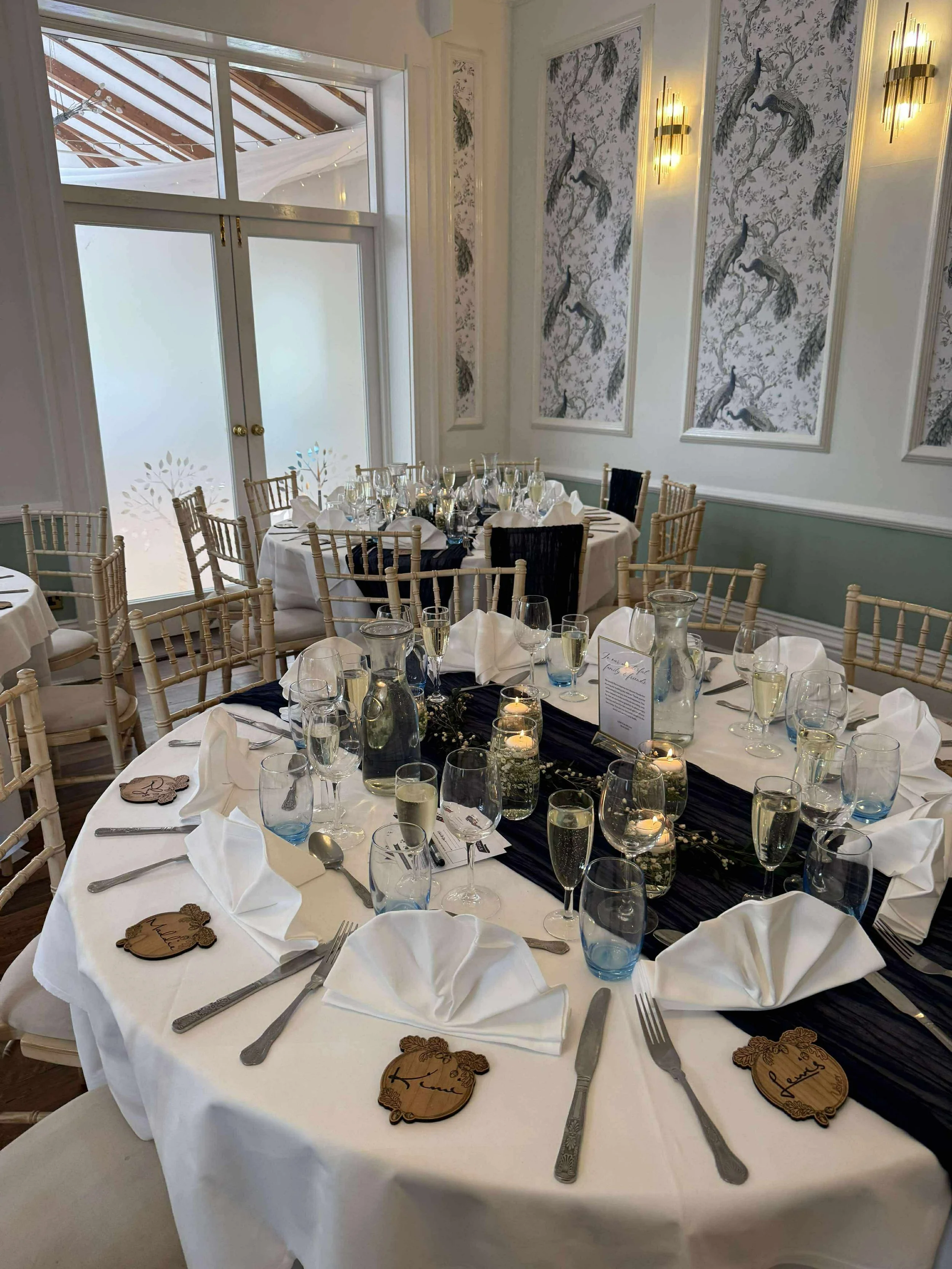 Always popular, these engraved coasters can be made in a wide variety of shapes and finishes. They're a great keepsake for guests and serve a practical purpose on the day as well.