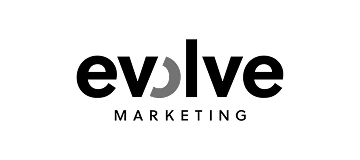 Silhouette of a cat sitting with a crescent moon in the night sky