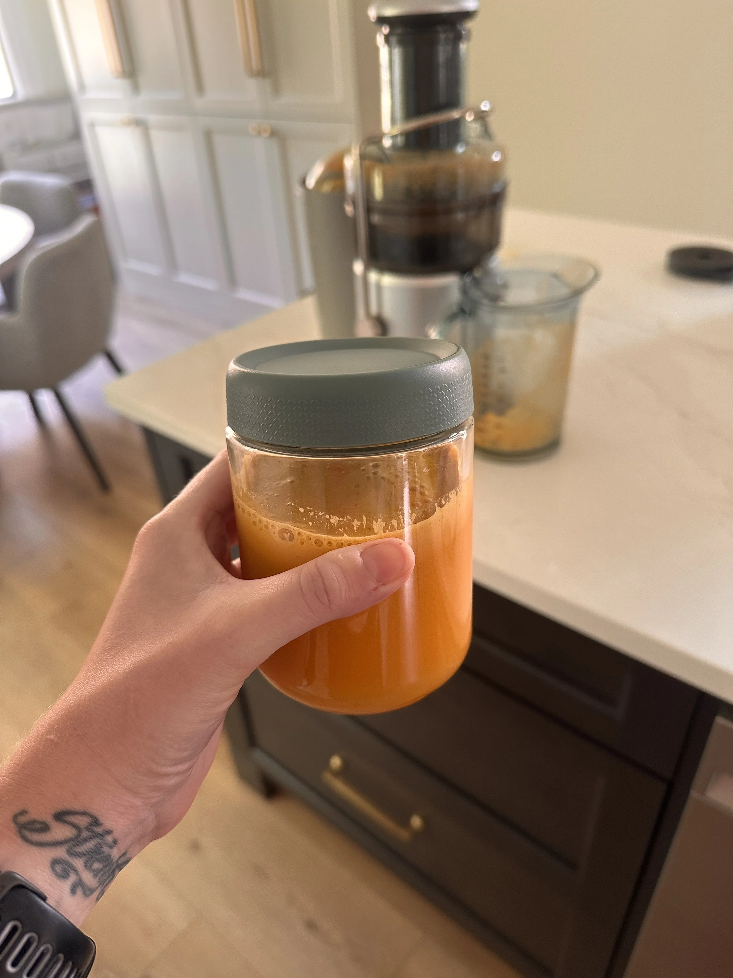 A jar of fresh morning wellness juice for runners to improve immunity.