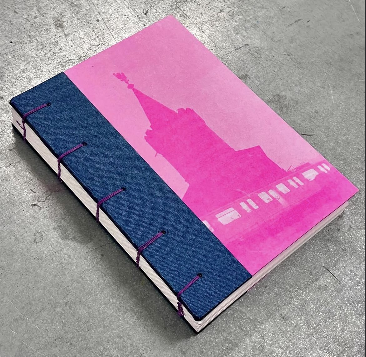 Coptic stitch, quarter-leather bound sketchbook with RISO printed cover, 2025.