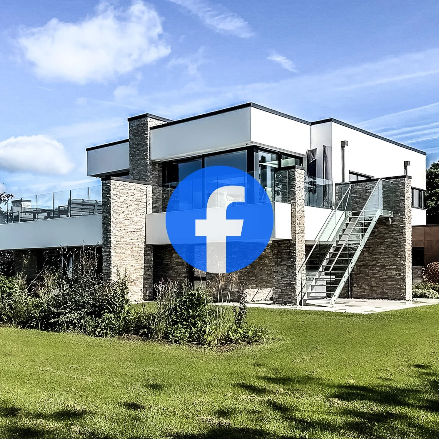 Modern house with stone and white exterior, glass balcony, and outdoor staircase, designed by Tony Holt Design, a CIAT-registered architectural practice.