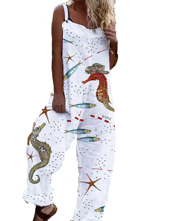 A person wearing a white sleeveless jumpsuit decorated with colorful sea life patterns, including seahorses, fish, starfish, and a crab.