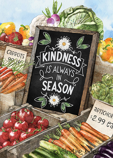 A chalkboard sign surrounded by fresh vegetables at a farmers market. The sign reads 'Kindness is always in season' with daisies and greenery illustrations. Vegetables include tomatoes, carrots, artichokes, and zucchini.