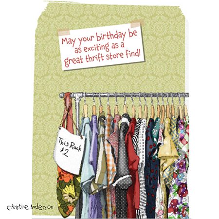 A clothing rack with various colorful dresses and garments, a handwritten tag says 'This Rack 2', and a sign reads 'May your birthday be as exciting as a great thrift store find!'