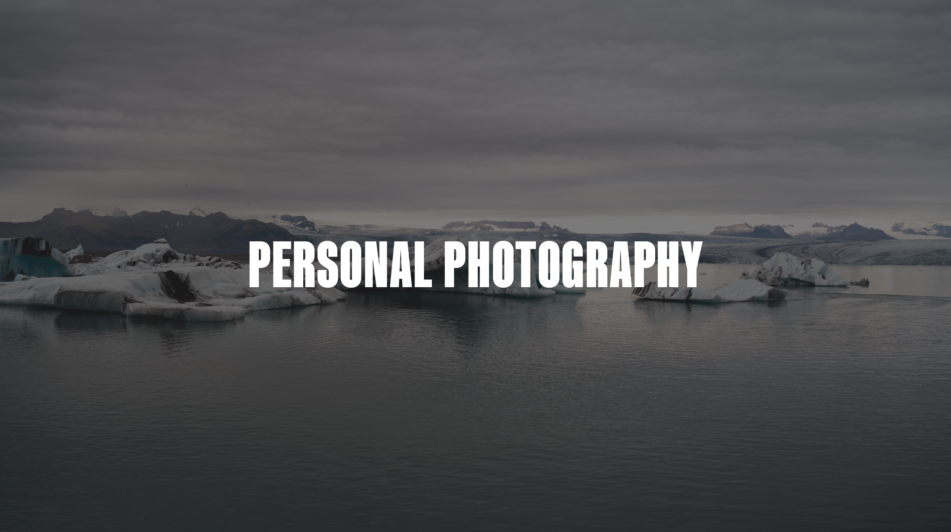 A landscape of icy glaciers and mountains under a cloudy sky with water in the foreground, overlaid with the text 'Personal Photography' in bold white letters.