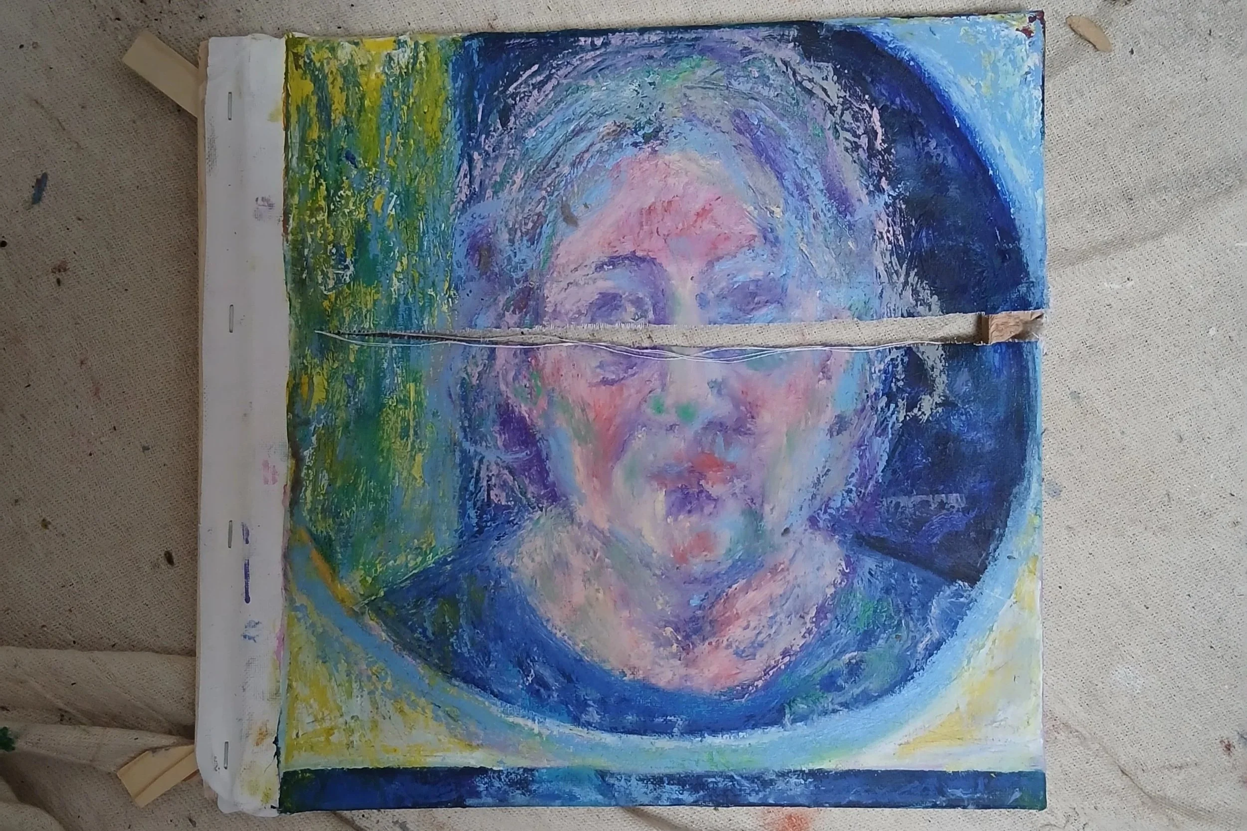 destroyed painting of a self portrait in oils on canvas