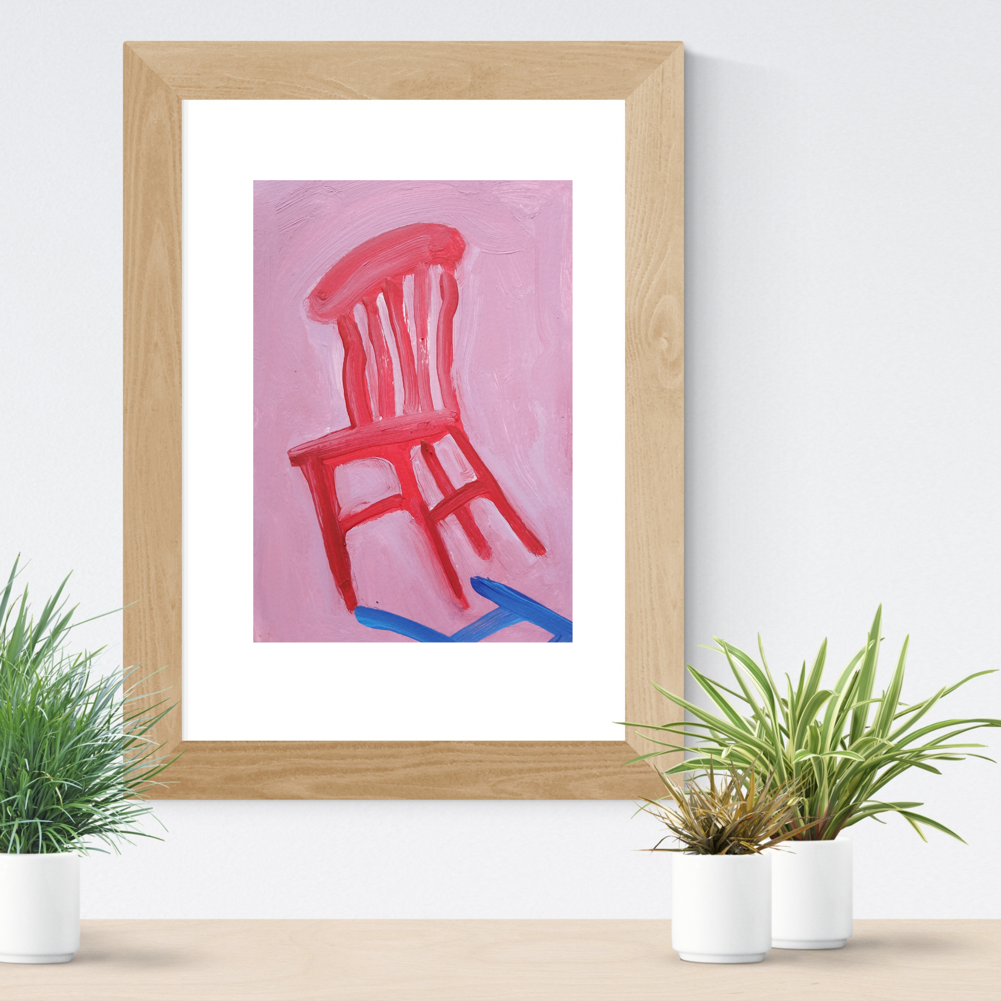 red chair blue shadow framed example with plants.png