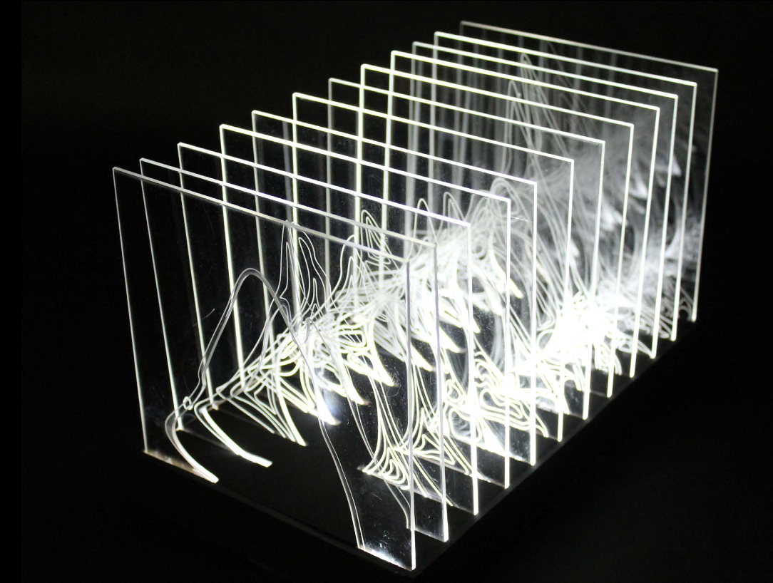 A multi-layered acrylic art installation with illuminated white lines creating intricate swirling patterns.