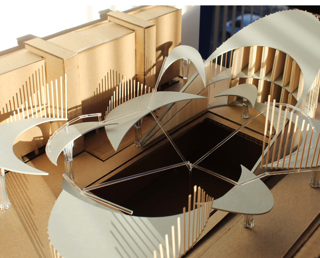 A detailed architectural model of a building with curved white and wooden elements, open spaces, and a central black area, supported by transparent stands.
