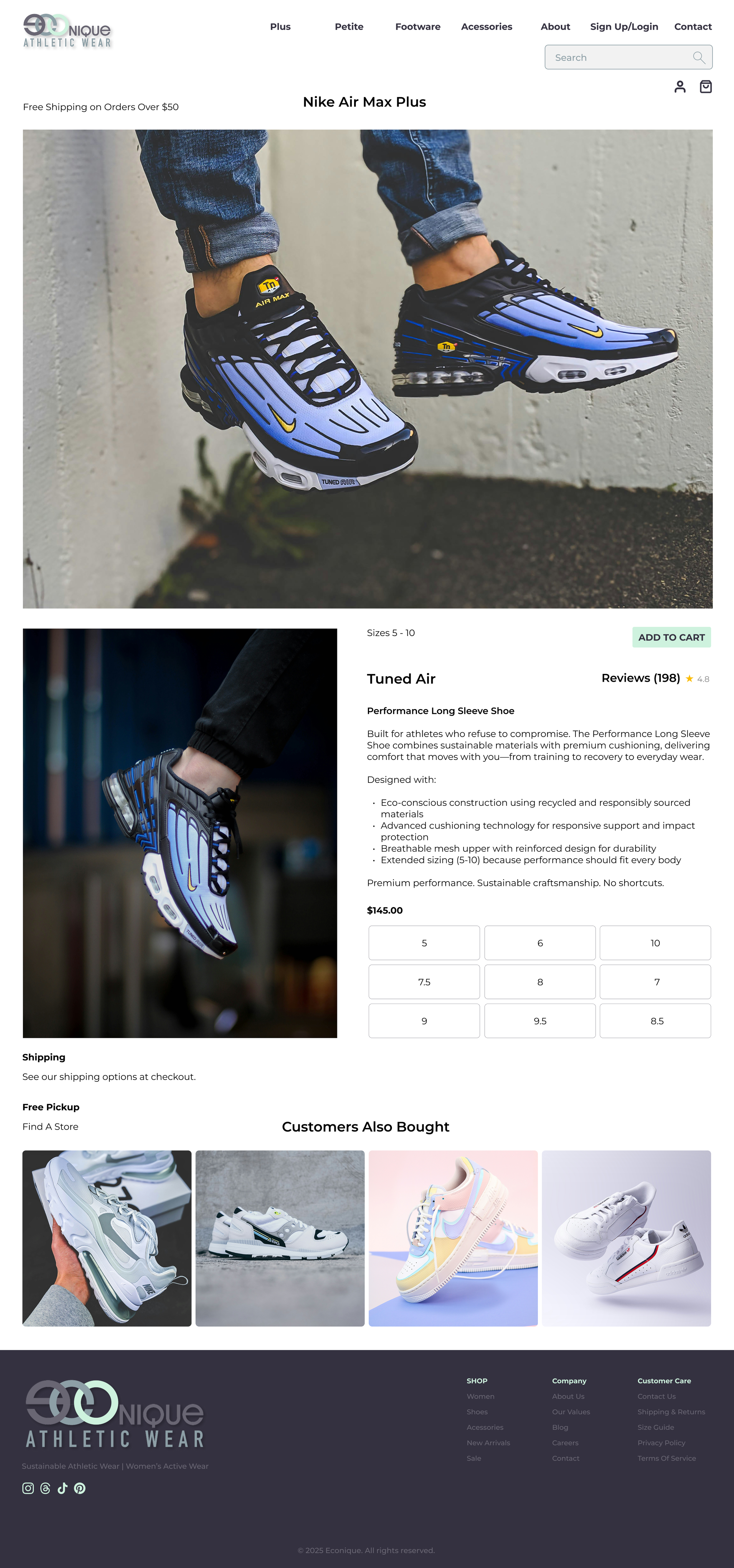 Close-up of a person wearing Nike Air Max Plus sneakers in black, blue, and white, with visible air cushioning soles, standing on a sidewalk near a textured wall.