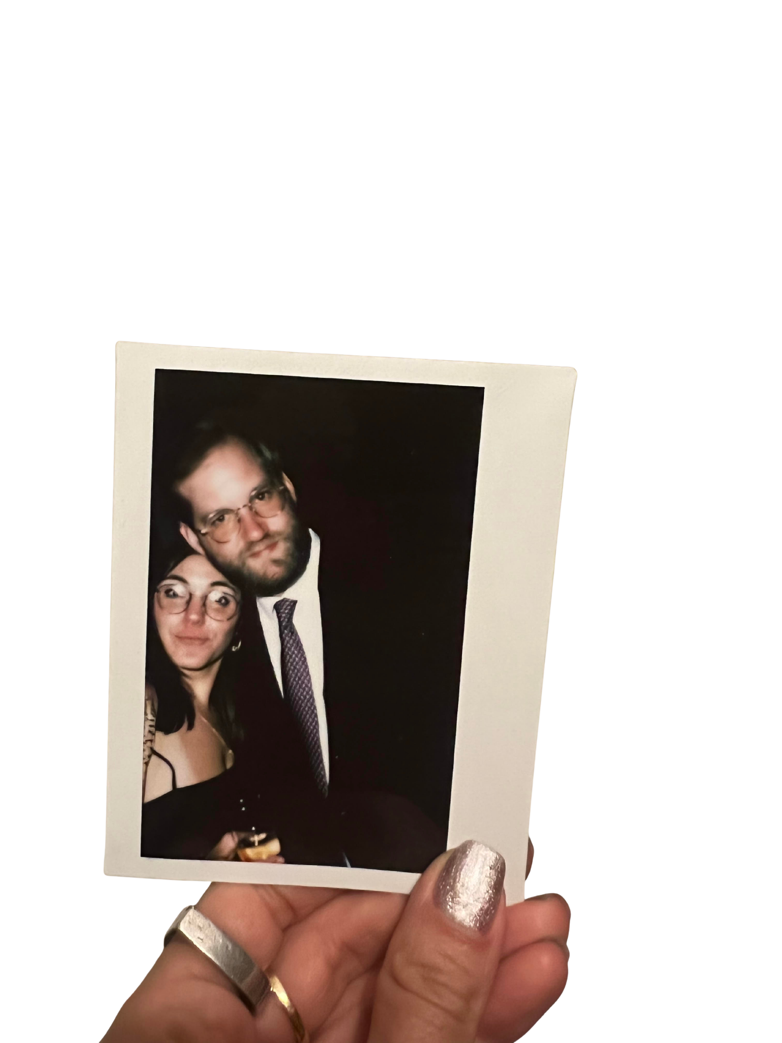 The first photo of us, taken at Sammy and Zelda's wedding. Thanks, Zanna!