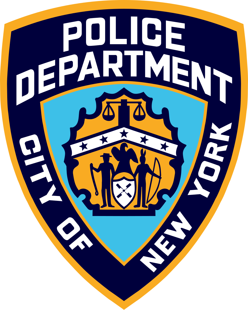 Badge of the New York City Police Department with blue shield, yellow border, and emblem featuring scales of justice, a balance, and police figures.