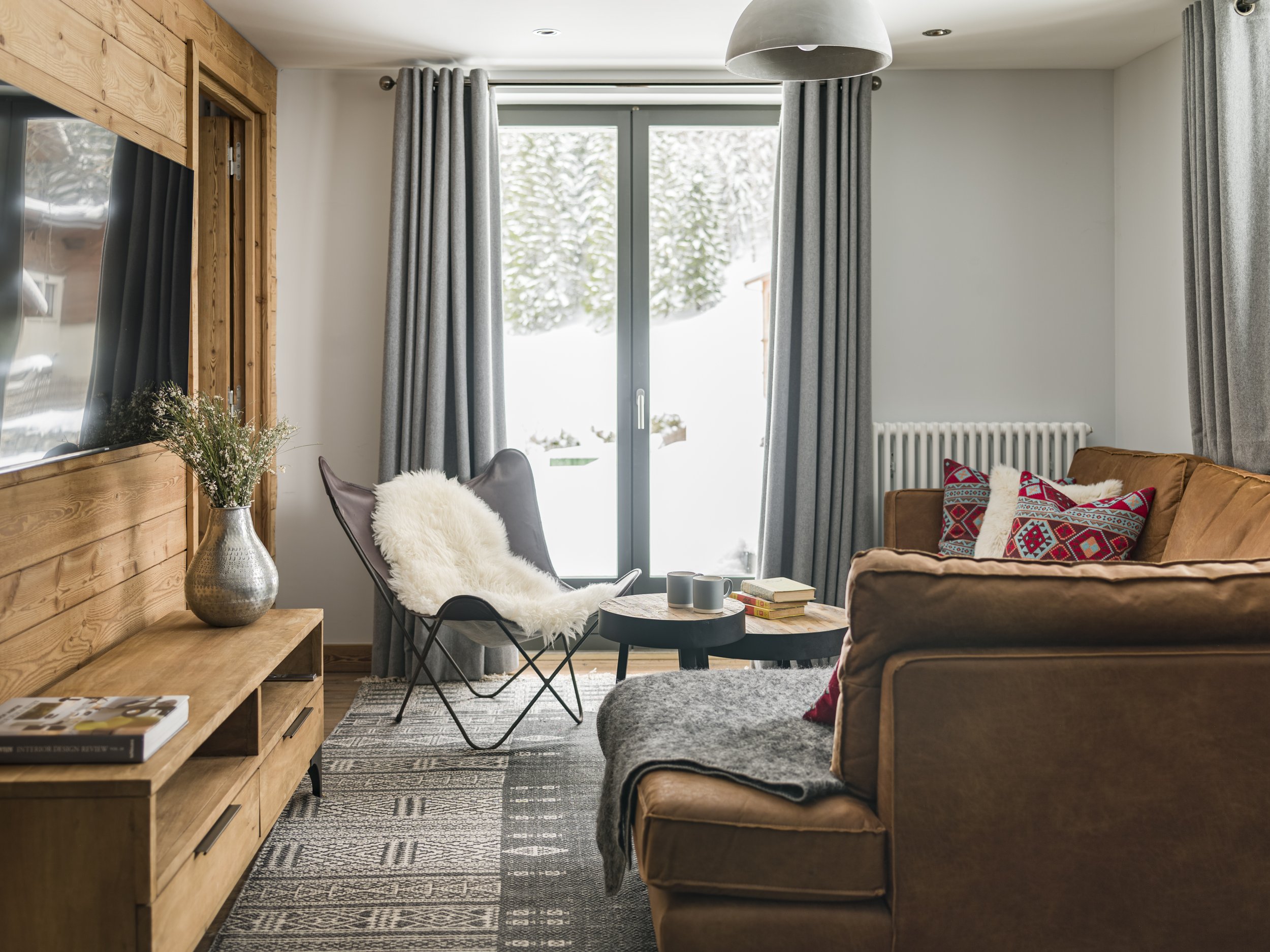 Comfy leather sofa and luxury wool made to measure curtains