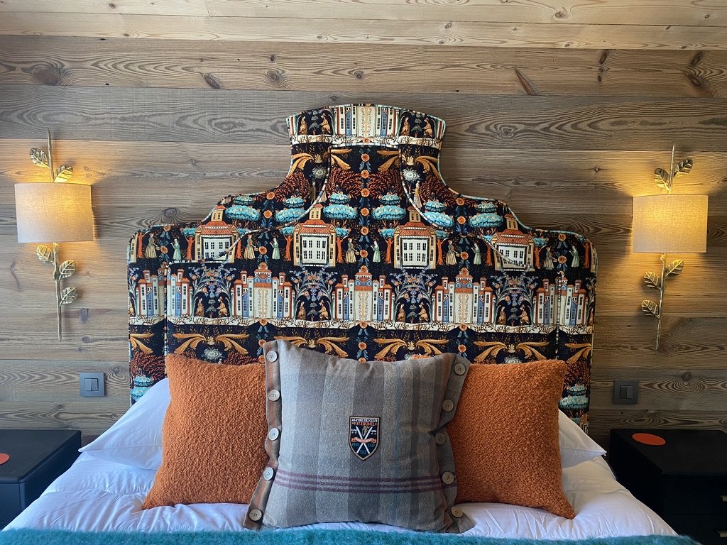 Bedside lights from vaughan designs complement the wonderful bespoke made to measure headboard. 