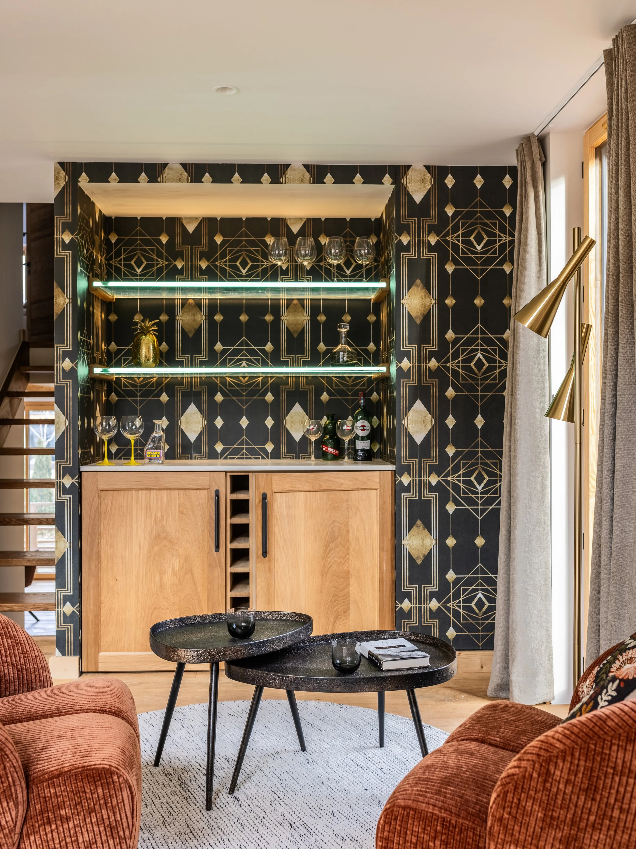 Mind the Gap Gatsby wallpaper bar with LED lights and taj mahal counter top. 